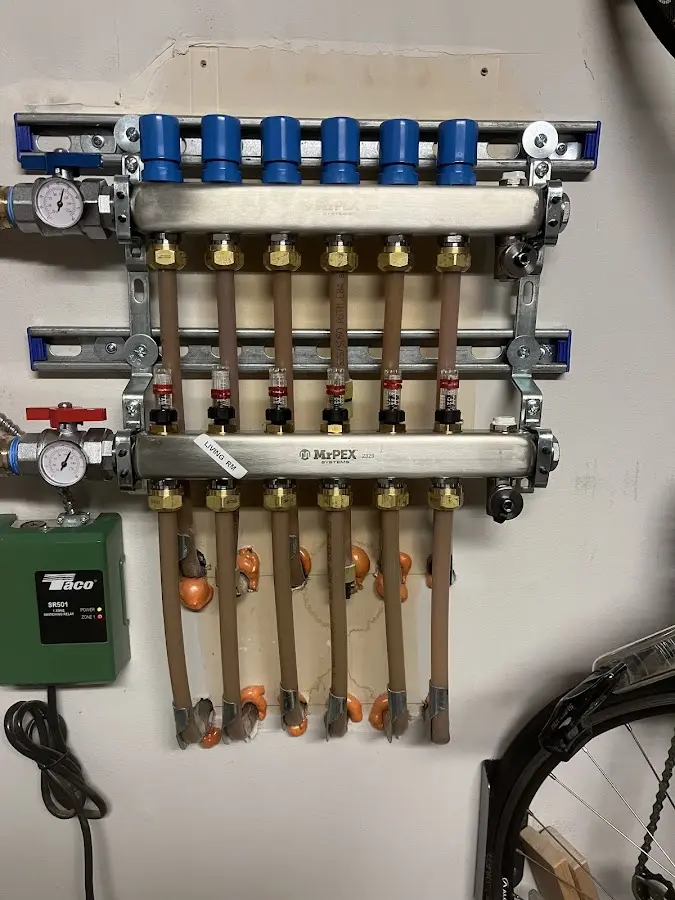 Plumber performing Gas Line Installation at a residential property in North Adams